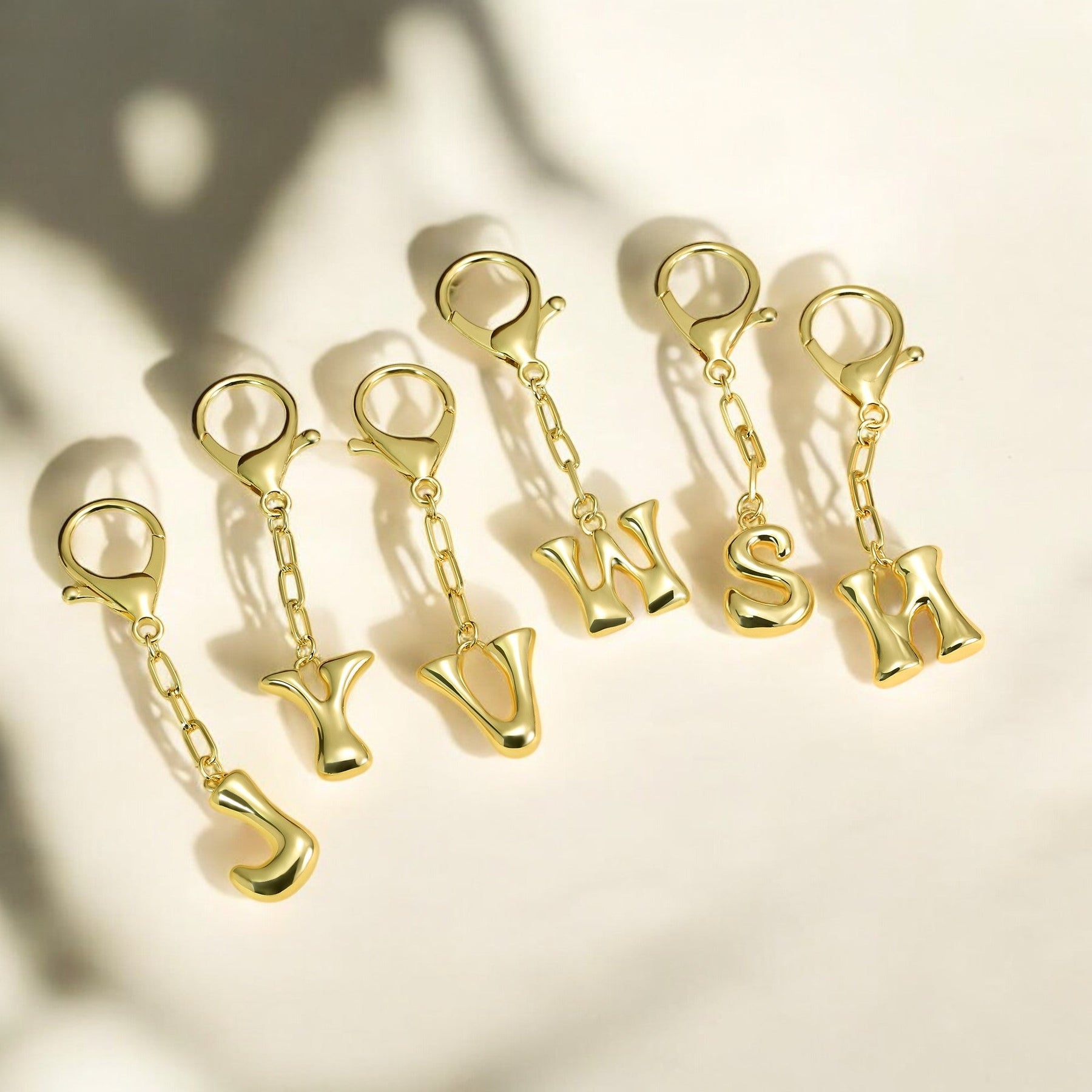 Porte-clés initial lettre bulle et charme de sac
