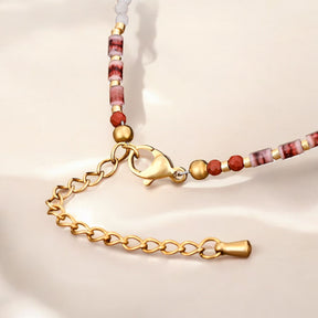 Scharlachrote Harmonie Fußkette