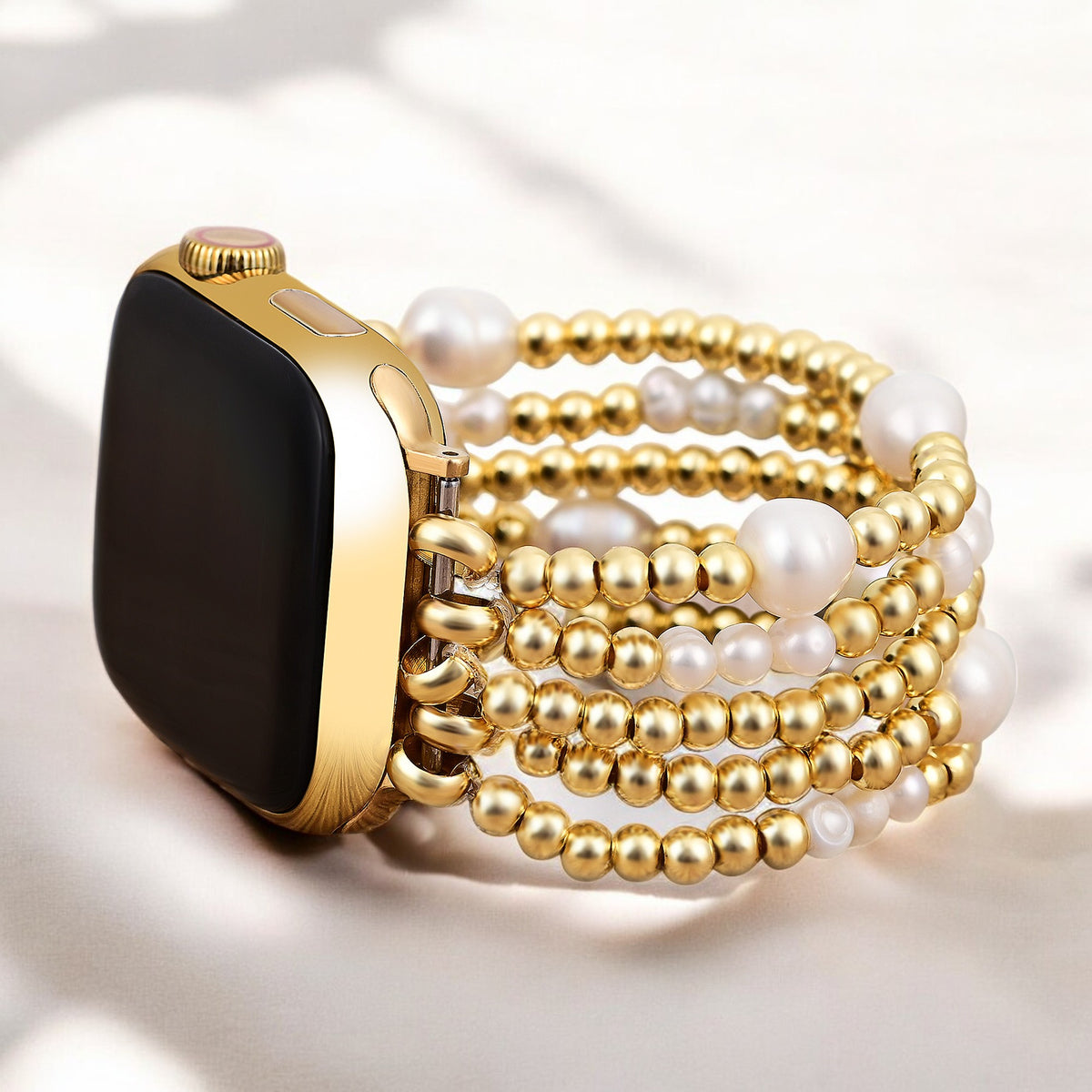 Bracelet extensible Apple Watch en or et perle