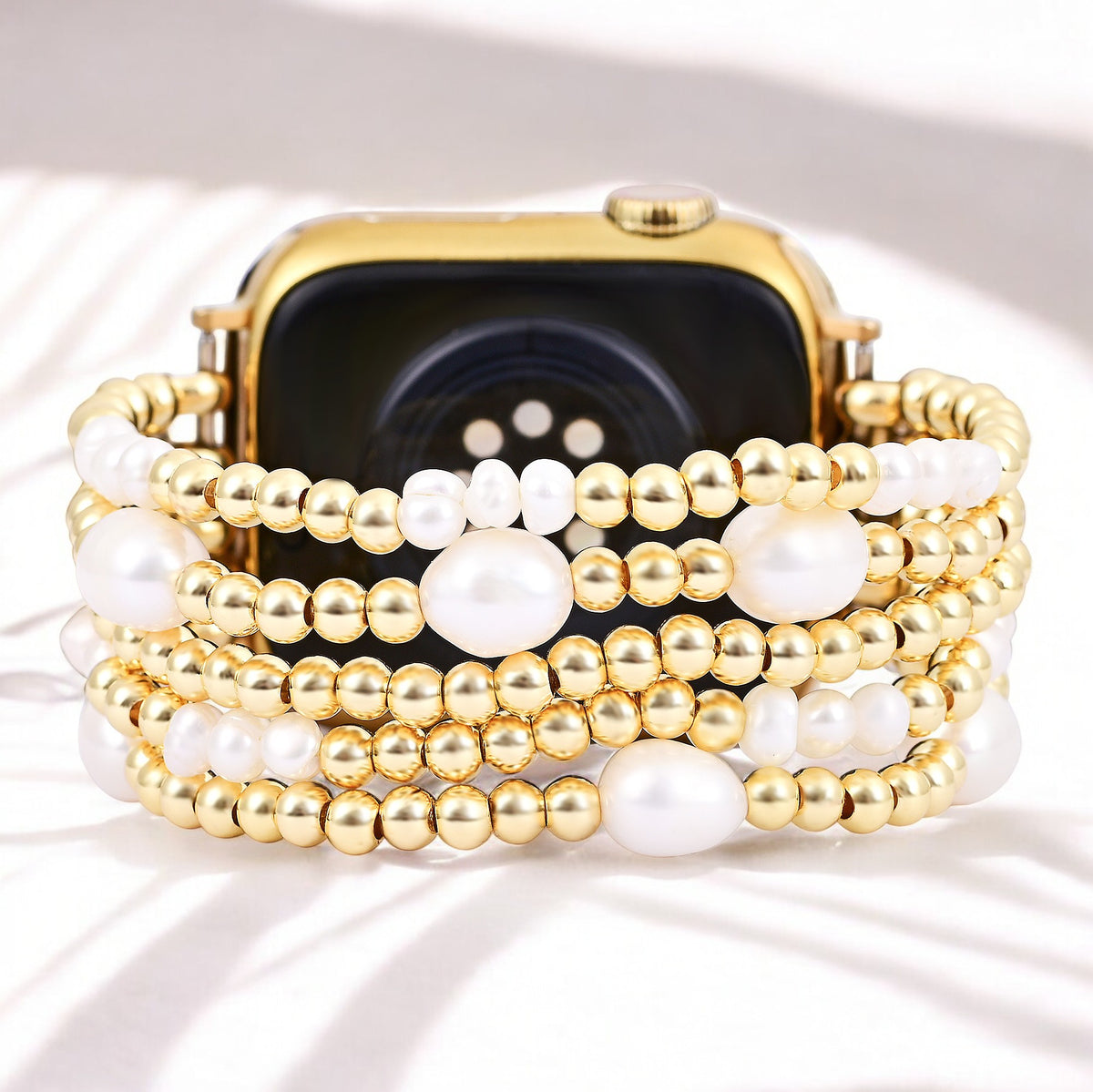 Bracelet extensible Apple Watch en or et perle